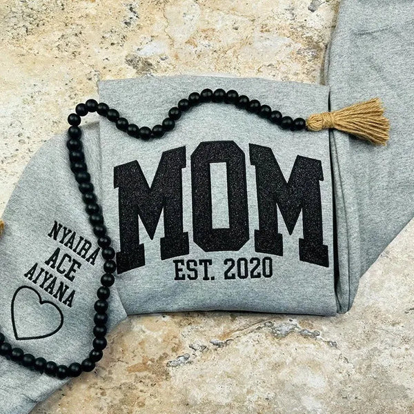 Felpa con applicazione ricamata "G Litter Mama" e il nome del bambino è ONS Eve
